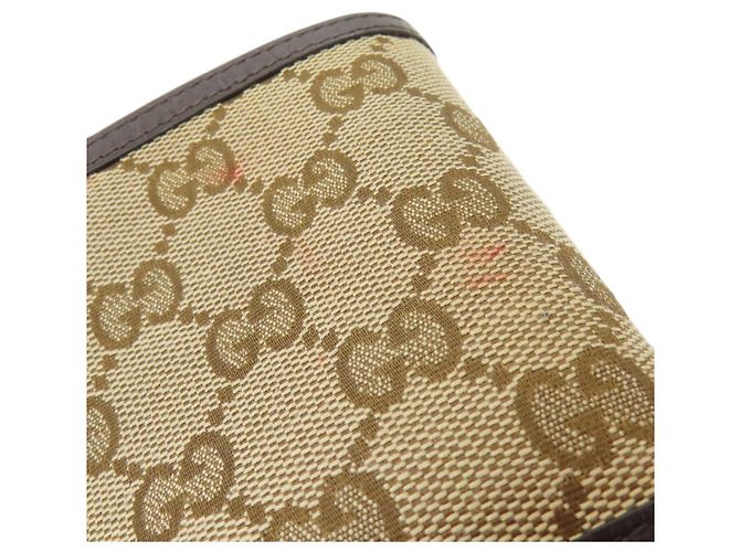 Portafoglio bi-fold Gucci in tela e pelle marrone - vista 16