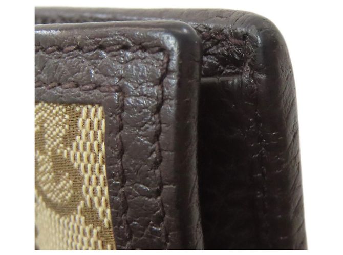 Portafoglio bi-fold Gucci in tela e pelle marrone - vista 20