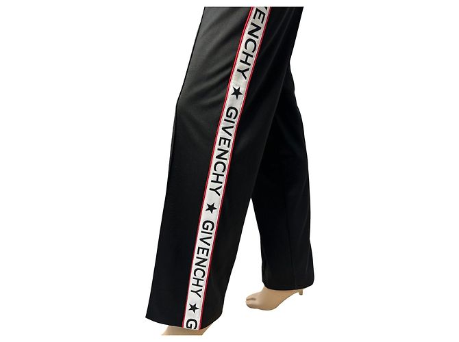 Tuta Givenchy nera con strisce laterali a contrasto Taglia M usata - vista 4