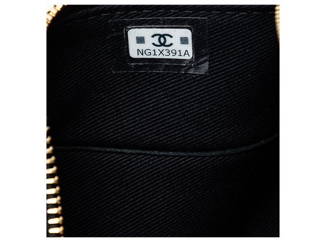 Clutch rectangular de piel de cordero negro Chanel Metiers d'Art CC con cadena y borla - vista 6