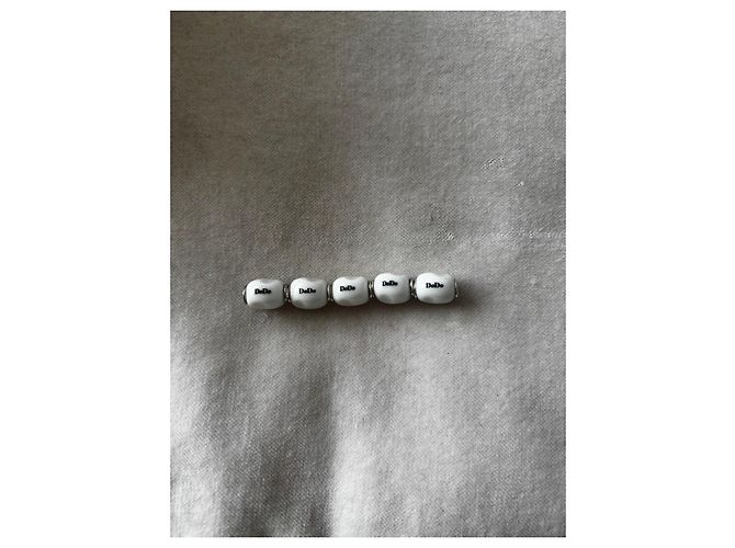Dodo Pomellato Set di 5 charm / pepite Dodo in argento ed email bianco Silver hardware - vista 2