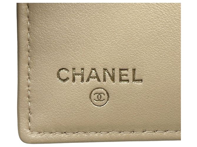Portafoglio bi-fold Chanel in beige oro D'oro - vista 5