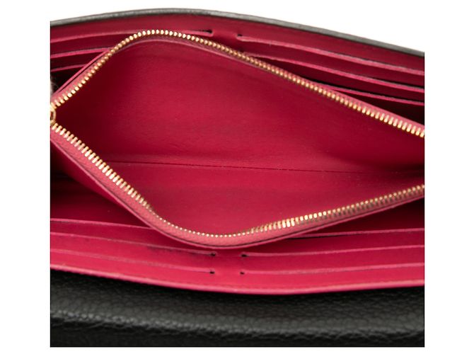 Cartera larga Capucines en taurillon negro Louis Vuitton - vista 4