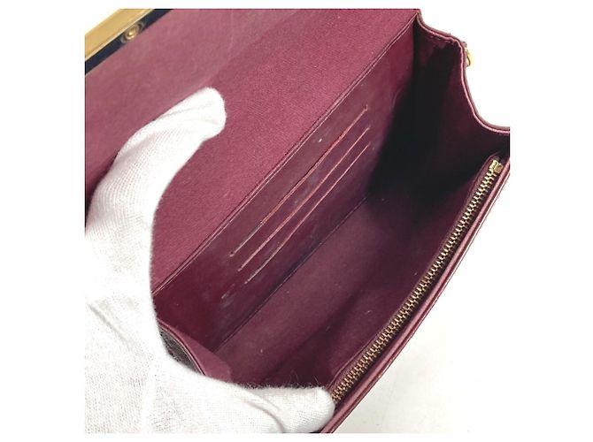 Borsa Clutch Rossmore PM in Monogram Vernis di Louis Vuitton Rosso Porpora - vista 8
