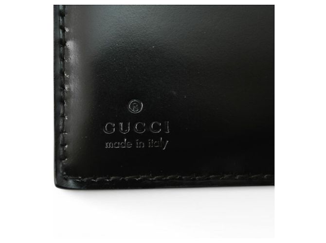Gucci Bi-Fold Geldbörse aus schwarzem Emaille-Leder - Ansicht 17
