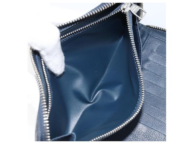 Portafoglio Verticale in Pelle Taurillon Clemence LOUIS VUITTON M58823 Auth bs34331 Blu navy - vista 12