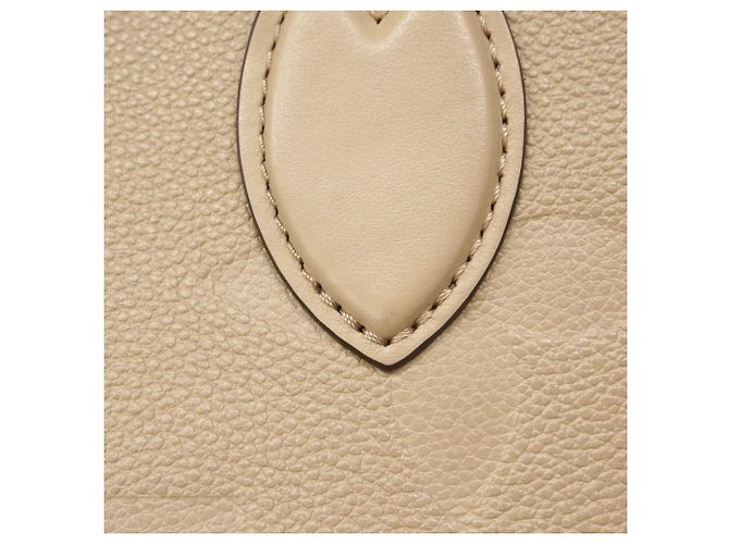 Borsa tote OnTheGo MM in Monogram Empreinte Louis Vuitton Beige - vista 10