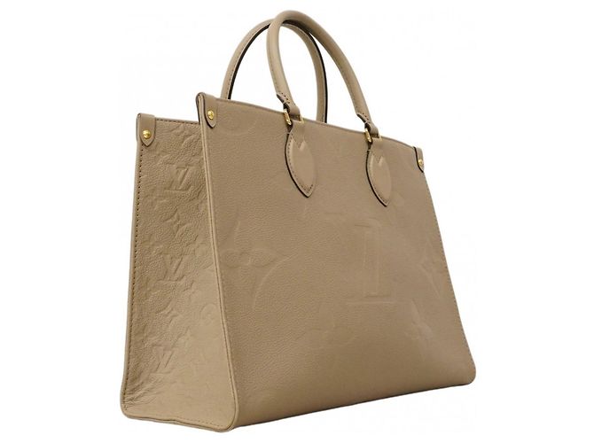 Borsa tote OnTheGo MM in Monogram Empreinte Louis Vuitton Beige - vista 2