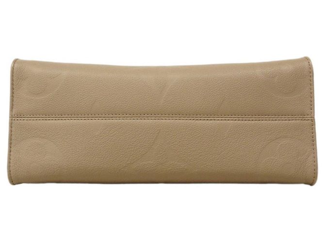 Borsa tote OnTheGo MM in Monogram Empreinte Louis Vuitton Beige - vista 3