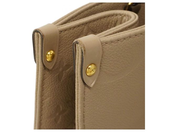 Borsa tote OnTheGo MM in Monogram Empreinte Louis Vuitton Beige - vista 6