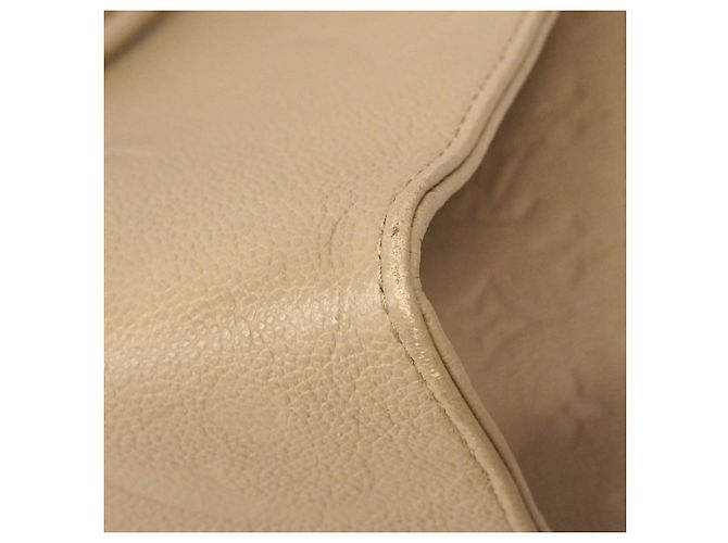 Borsa tote OnTheGo MM in Monogram Empreinte Louis Vuitton Beige - vista 7