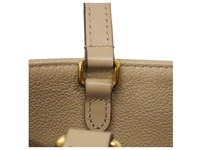 Borsa tote OnTheGo MM in Monogram Empreinte Louis Vuitton Beige - vista 8