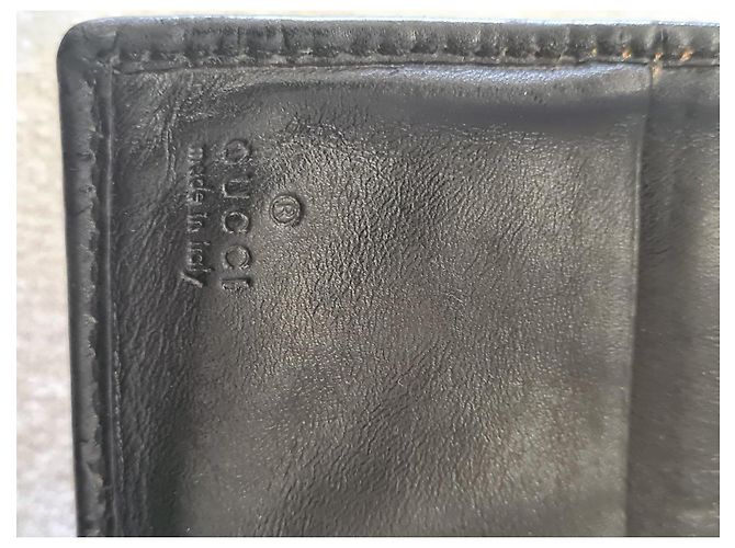 Gucci black leather wallet with embossed GG - view 7