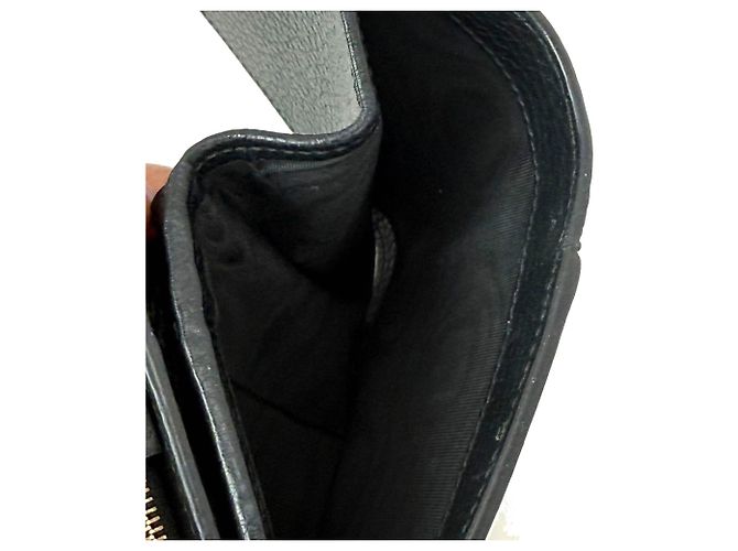 Portafoglio compatto in pelle nera GG Supreme di Gucci Nero - vista 4