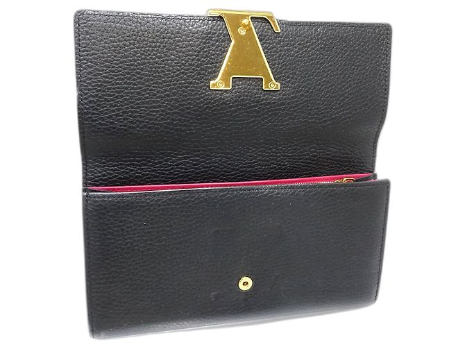 Cartera larga Capucines en taurillon negro Louis Vuitton - vista 12