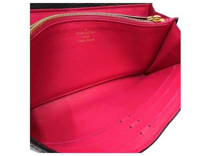 Cartera larga Capucines en taurillon negro Louis Vuitton - vista 4