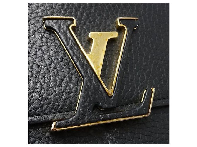 Cartera larga Capucines en taurillon negro Louis Vuitton - vista 8