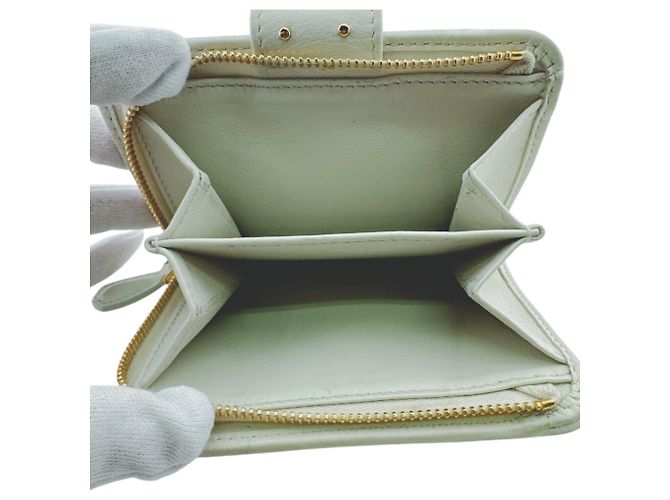 Portafoglio bi-fold Prada 1ML018 in pelle bianco oro D'oro - vista 15
