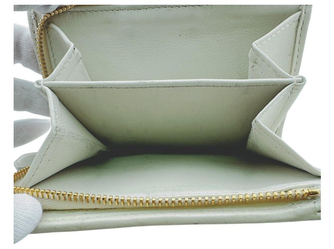 Portafoglio bi-fold Prada 1ML018 in pelle bianco oro D'oro - vista 17