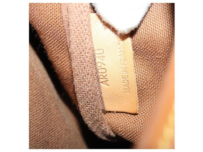 Louis Vuitton Saumur Monogram Canvas 35 Marrone - vista 6
