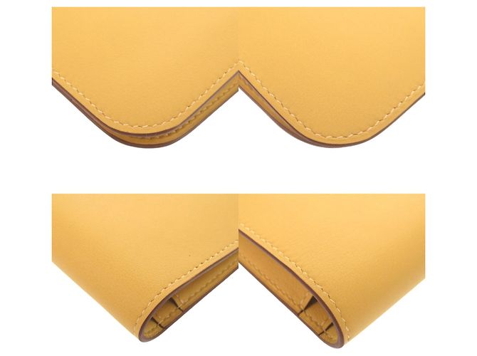 Billetera Dogon GM de Hermès en cuero Swift amarillo - vista 4