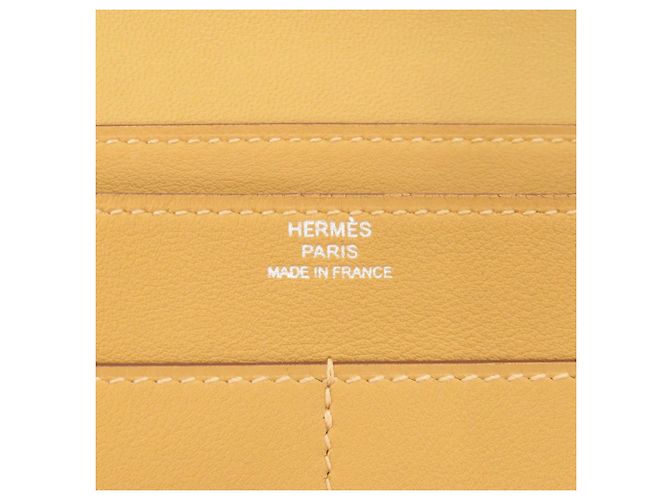 Billetera Dogon GM de Hermès en cuero Swift amarillo - vista 8
