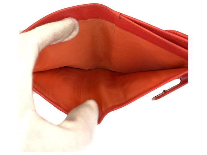 Billetera compacta de cuero Prada con logo, hardware dorado naranja - vista 9