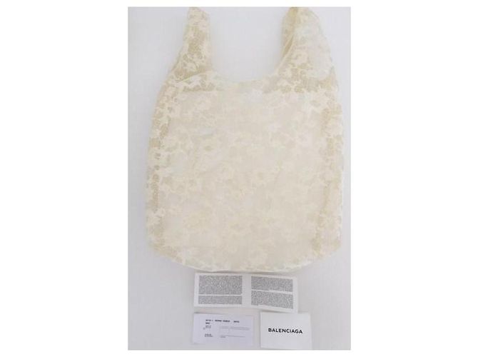 Bolsa shopper assinada Balenciaga em renda marfim/creme. - vista 2
