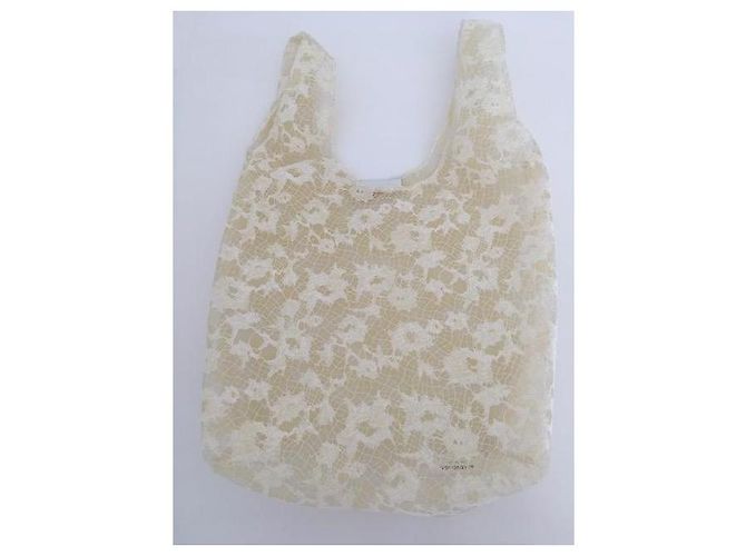 Bolsa shopper assinada Balenciaga em renda marfim/creme. - vista 4