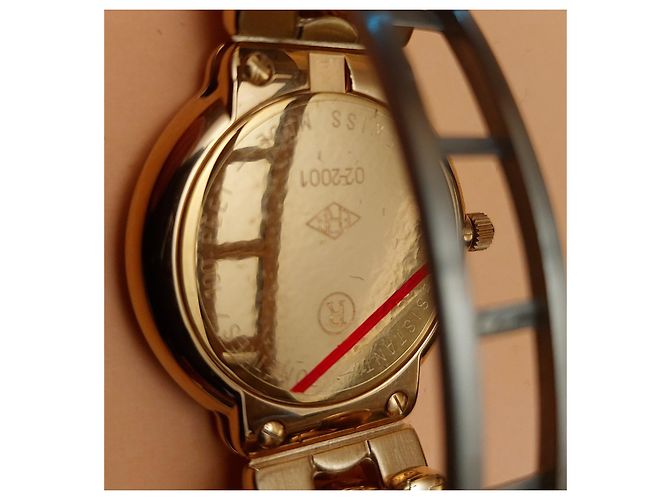 Relógio Courreges em aço com detalhes dourados 36 mm - vista 4