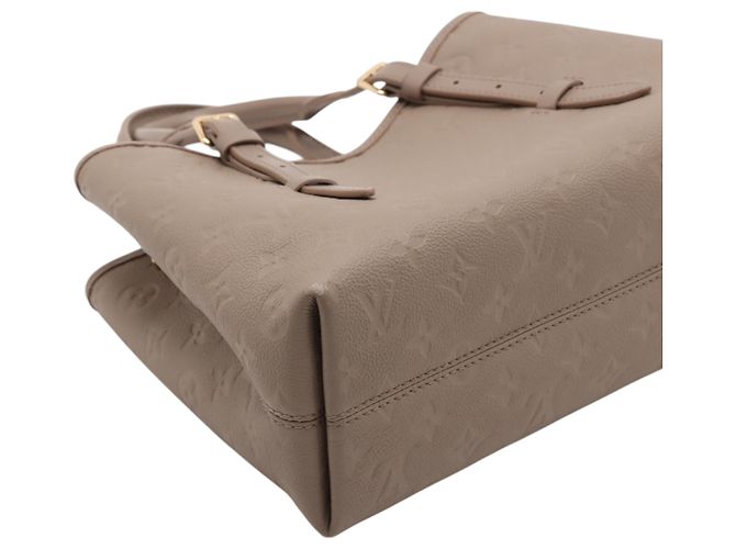 Borsa Tote Babylone PM in Monogram Empreinte beige di Louis Vuitton - vista 3