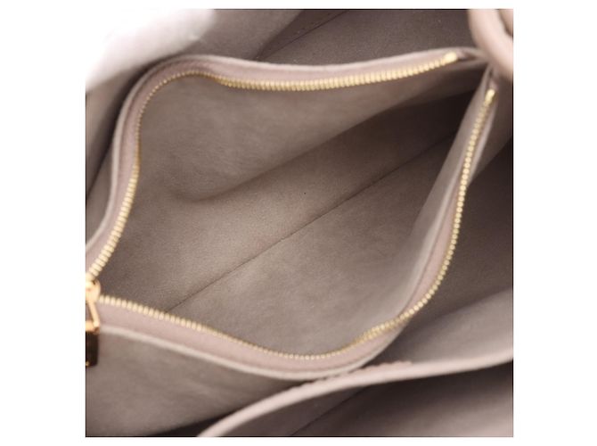 Borsa Tote Babylone PM in Monogram Empreinte beige di Louis Vuitton - vista 7