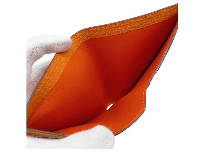 Billetera bi-fold compacta Evelyne de Hermès en naranja - vista 6