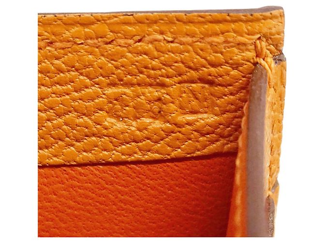 Billetera bi-fold compacta Evelyne de Hermès en naranja - vista 7