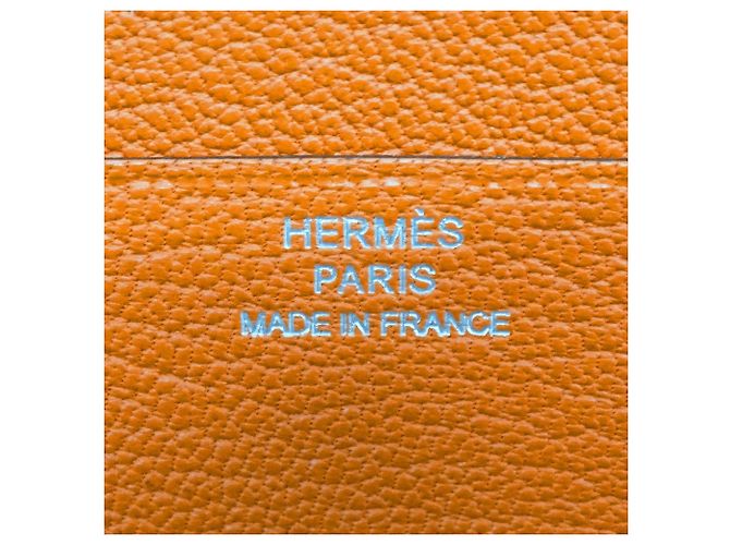 Billetera bi-fold compacta Evelyne de Hermès en naranja - vista 8