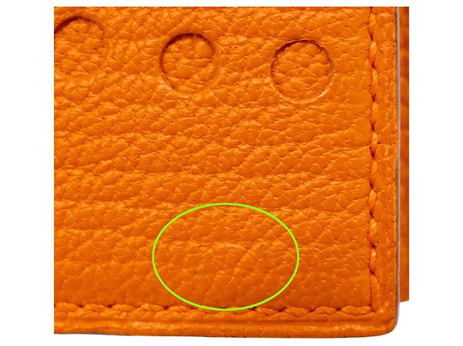 Billetera bi-fold compacta Evelyne de Hermès en naranja - vista 9