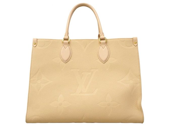 Borsa tote OnTheGo MM in Monogram Empreinte di Louis Vuitton Crudo - vista 12