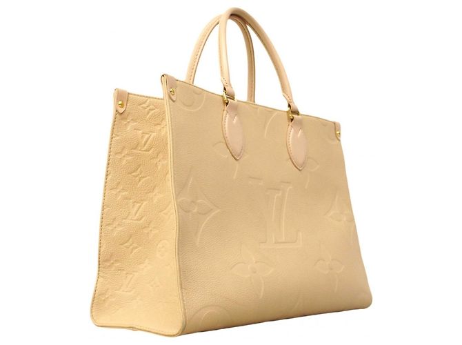 Borsa tote OnTheGo MM in Monogram Empreinte di Louis Vuitton Crudo - vista 2