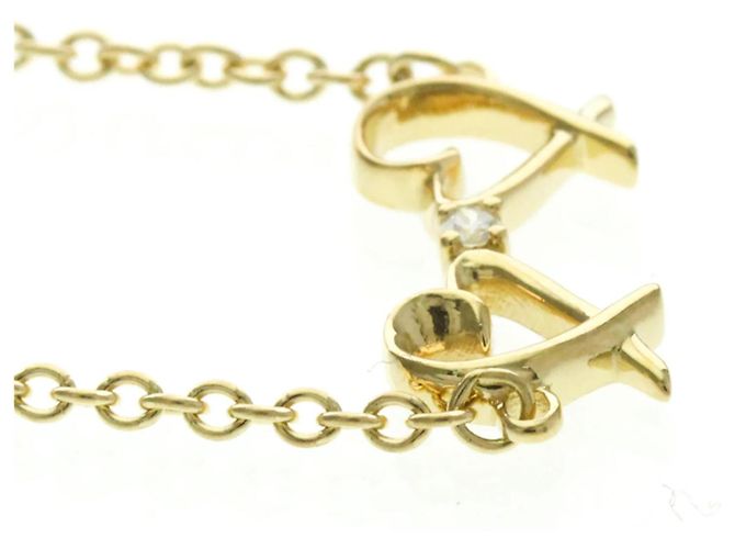 Bracciale Doppio Cuore Amore di Paloma Picasso in Oro Giallo 18K e Diamante di Tiffany & Co. - vista 4