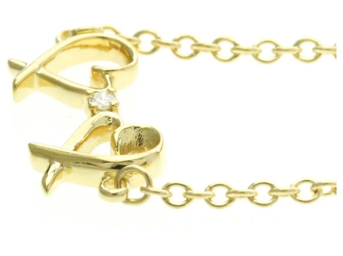 Bracciale Doppio Cuore Amore di Paloma Picasso in Oro Giallo 18K e Diamante di Tiffany & Co. - vista 5