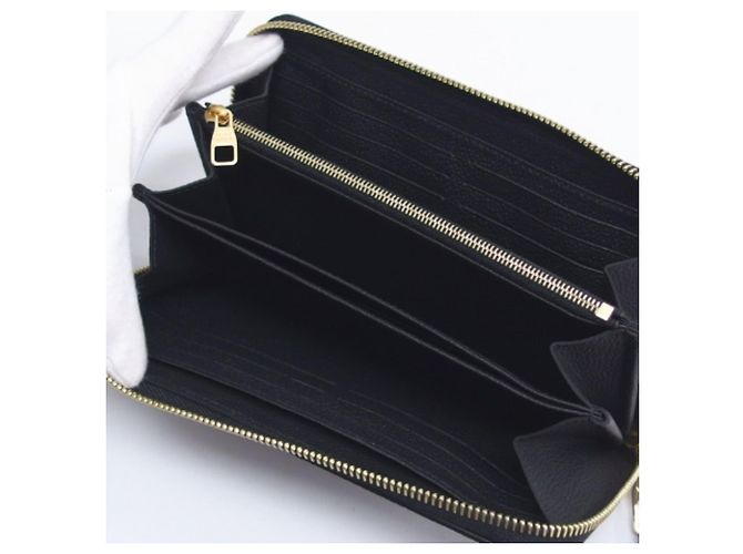 Portafoglio Zippy Studded Monogram Empreinte Louis Vuitton Nero - vista 6