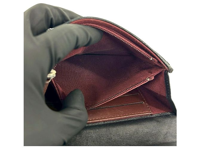 Billetera bifold de cuero de cordero matelassé Coco Mark de Chanel Negro - vista 8