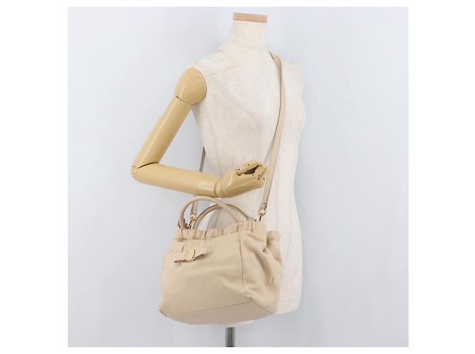 Borsa a mano Vala in pelle 2 in 1 avorio e oro Auth BA12126A di Salvatore Ferragamo - vista 29