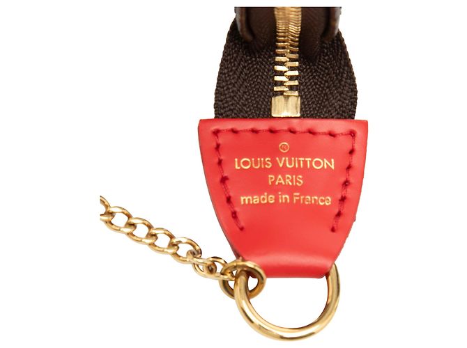 Mini Pochette Accessoires Vivienne Natale Monogramma Marrone Louis Vuitton - vista 5