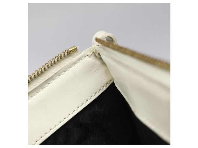 Pochette Delmonico Stretch in pelle Epi Louis Vuitton Beige - vista 7