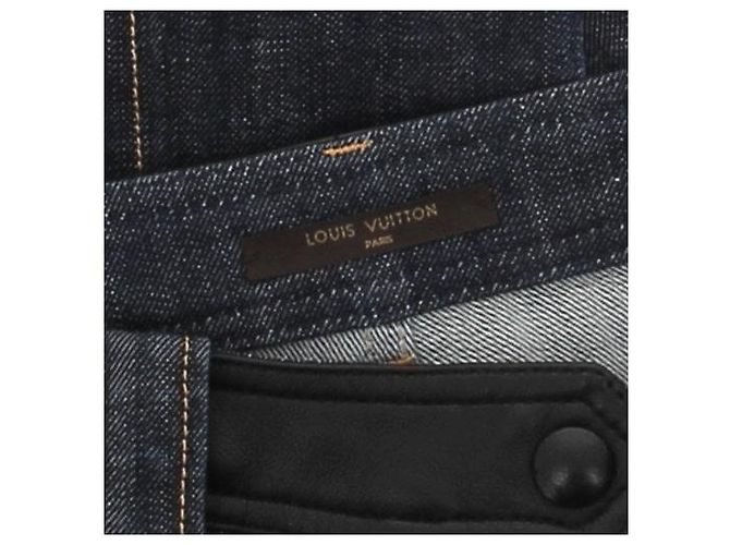 Louis Vuitton Jeans azules con cinturón de cuero - vista 5