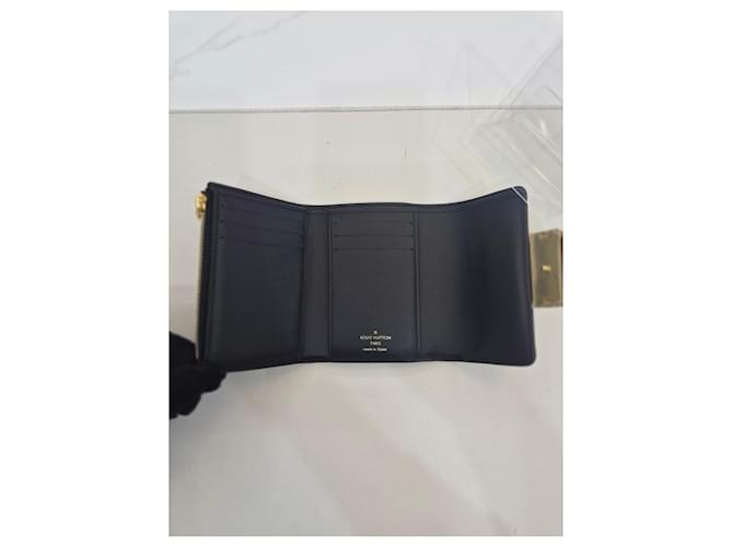 Louis Vuitton Billetera compacta con chip Castaño - vista 20