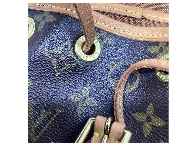 Louis Vuitton Montsouris Mini Backpack in Brown Coated Canvas Red - view 10
