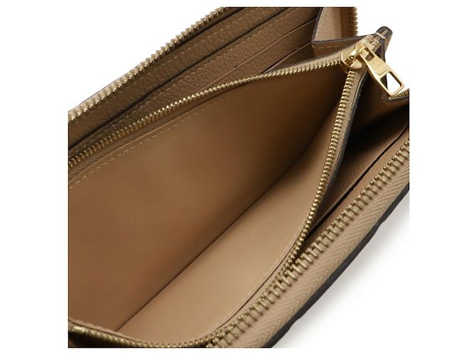 Portafoglio Clemence Monogram Empreinte Louis Vuitton Marrone Beige - vista 6