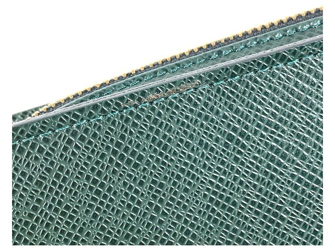 Pochette a mano Louis Vuitton Taiga Baikal Cachi - vista 4
